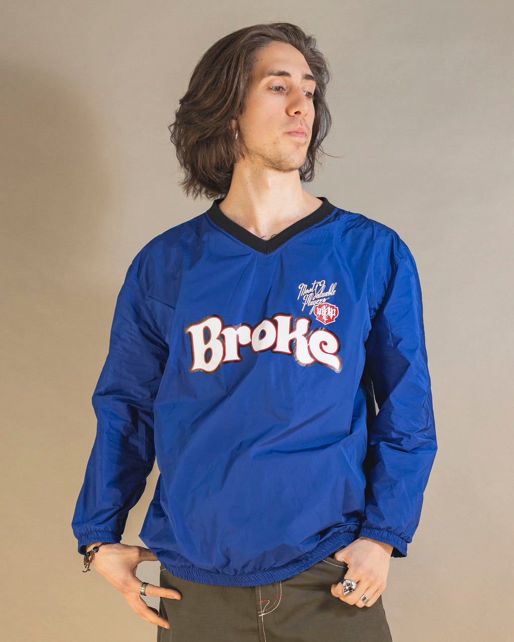 Pull ras du cou bleu cassé 