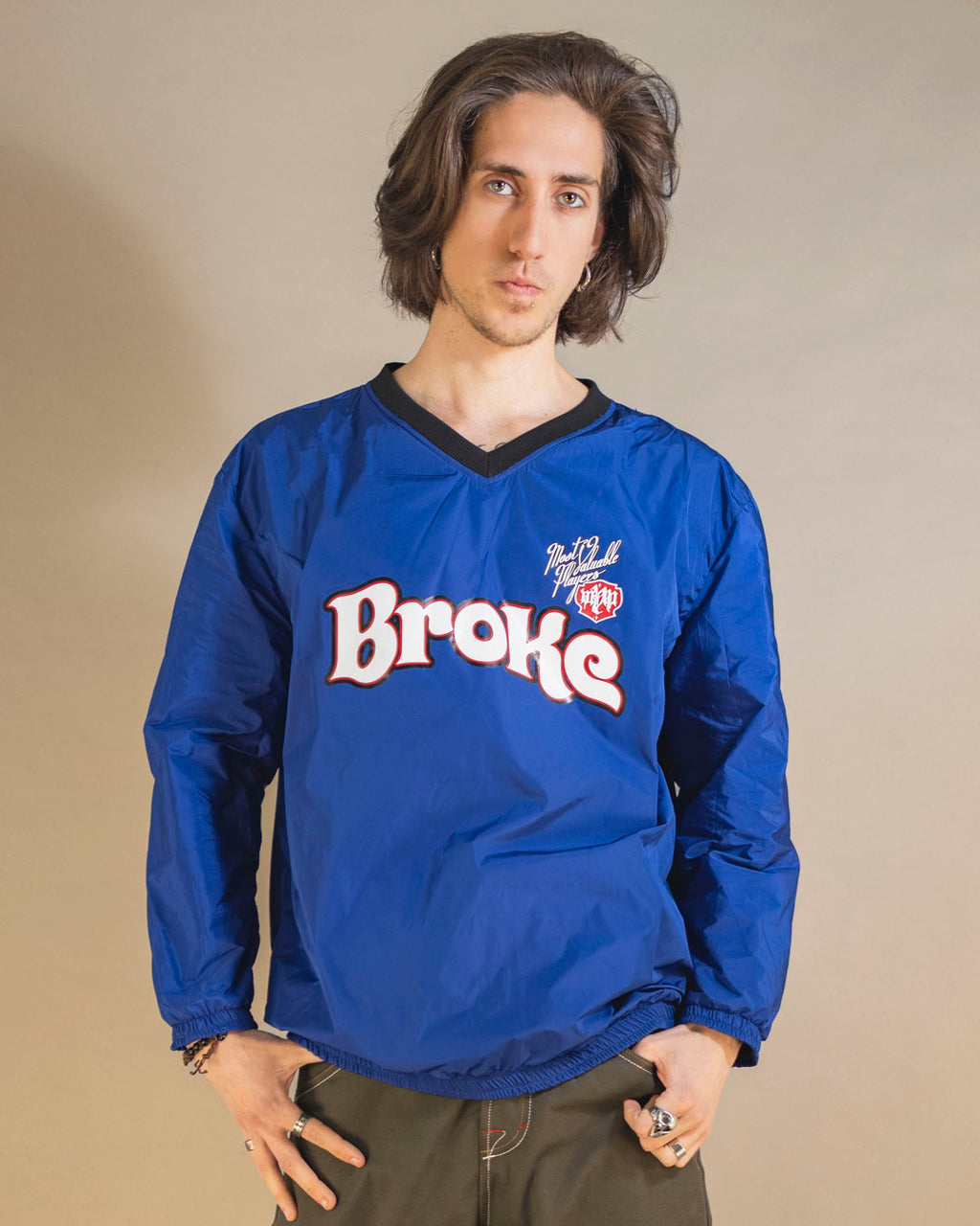 Pull ras du cou bleu cassé 